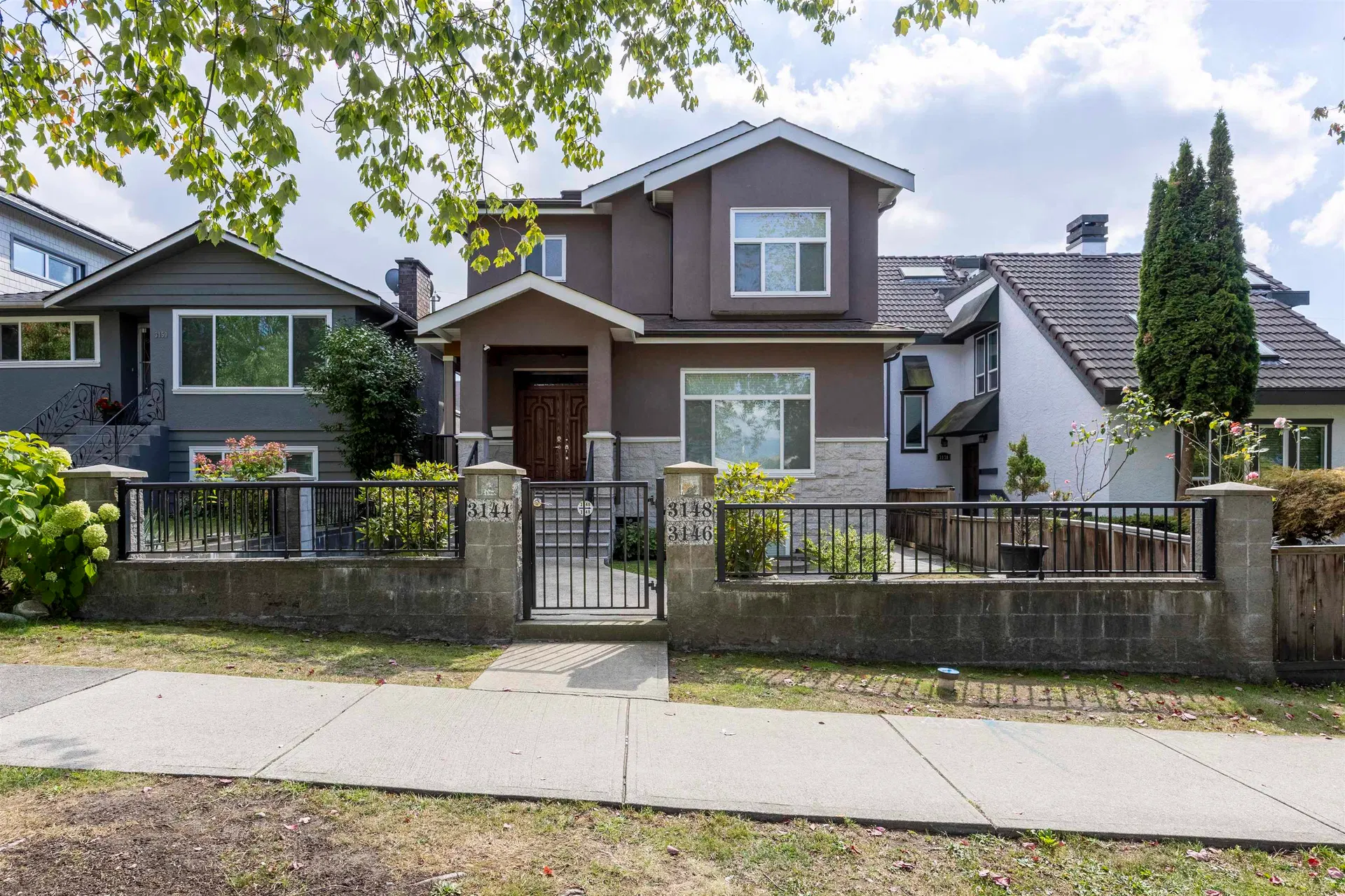 Photo 1 of 40 at 3144 E 22nd Avenue