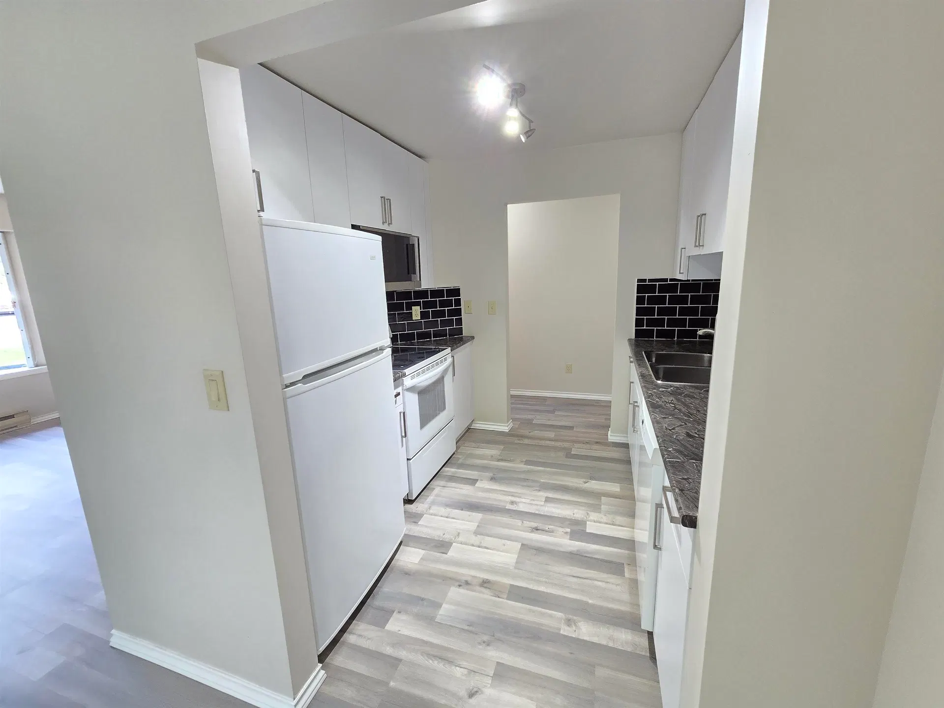 Photo 5 of 39 at #109 – 5250 Victory Street