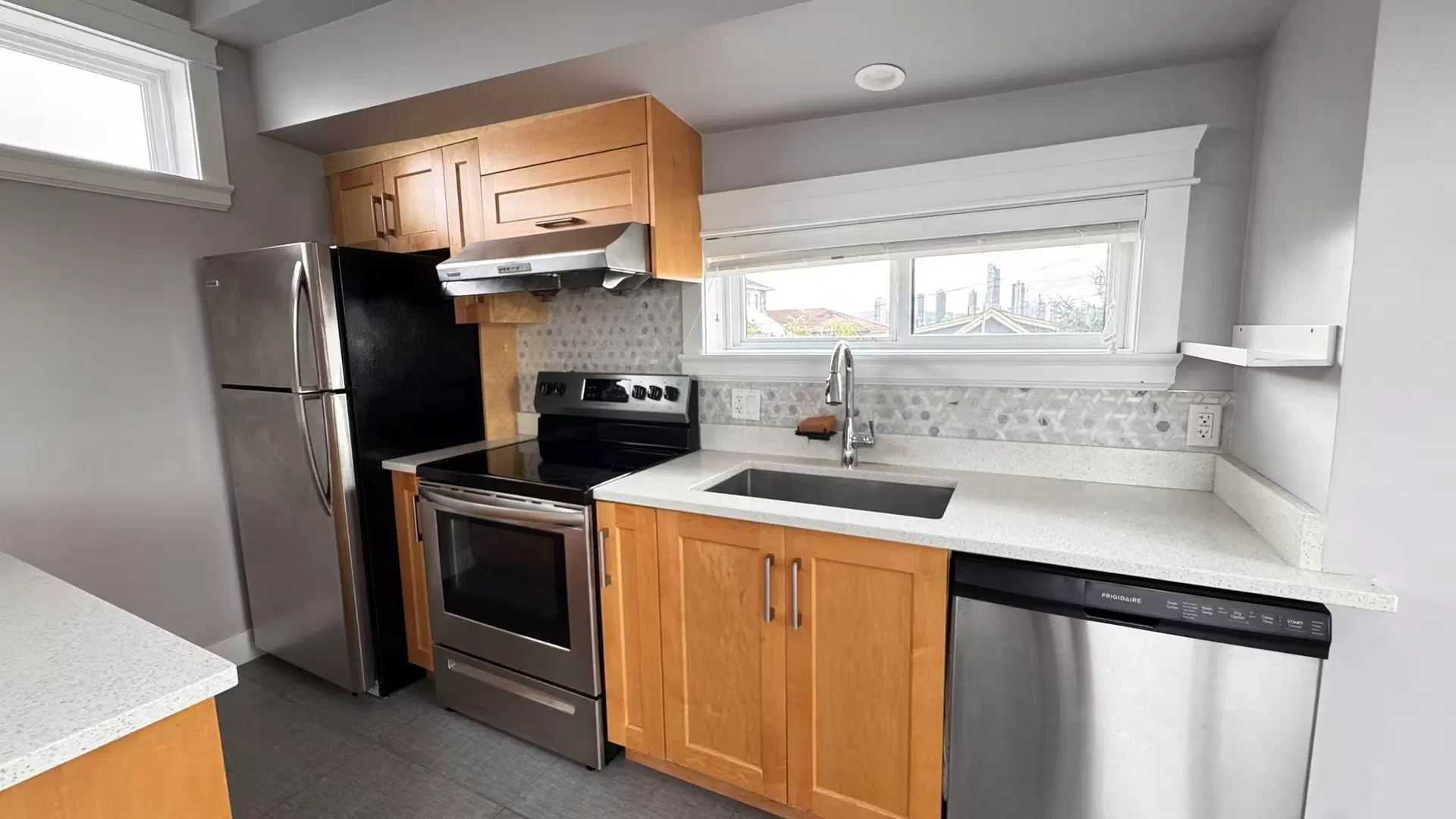 Photo 2 of 13 at Laneway House – 3202 E 5th Avenue
