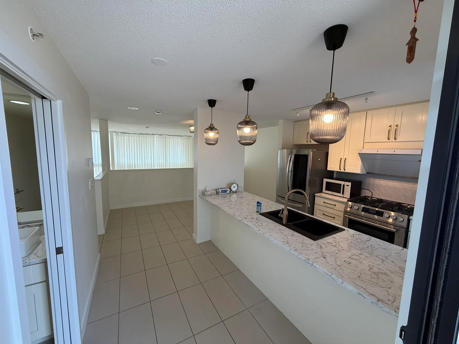 Photo 3 of 15 at #1 – 7911 Ackroyd Road