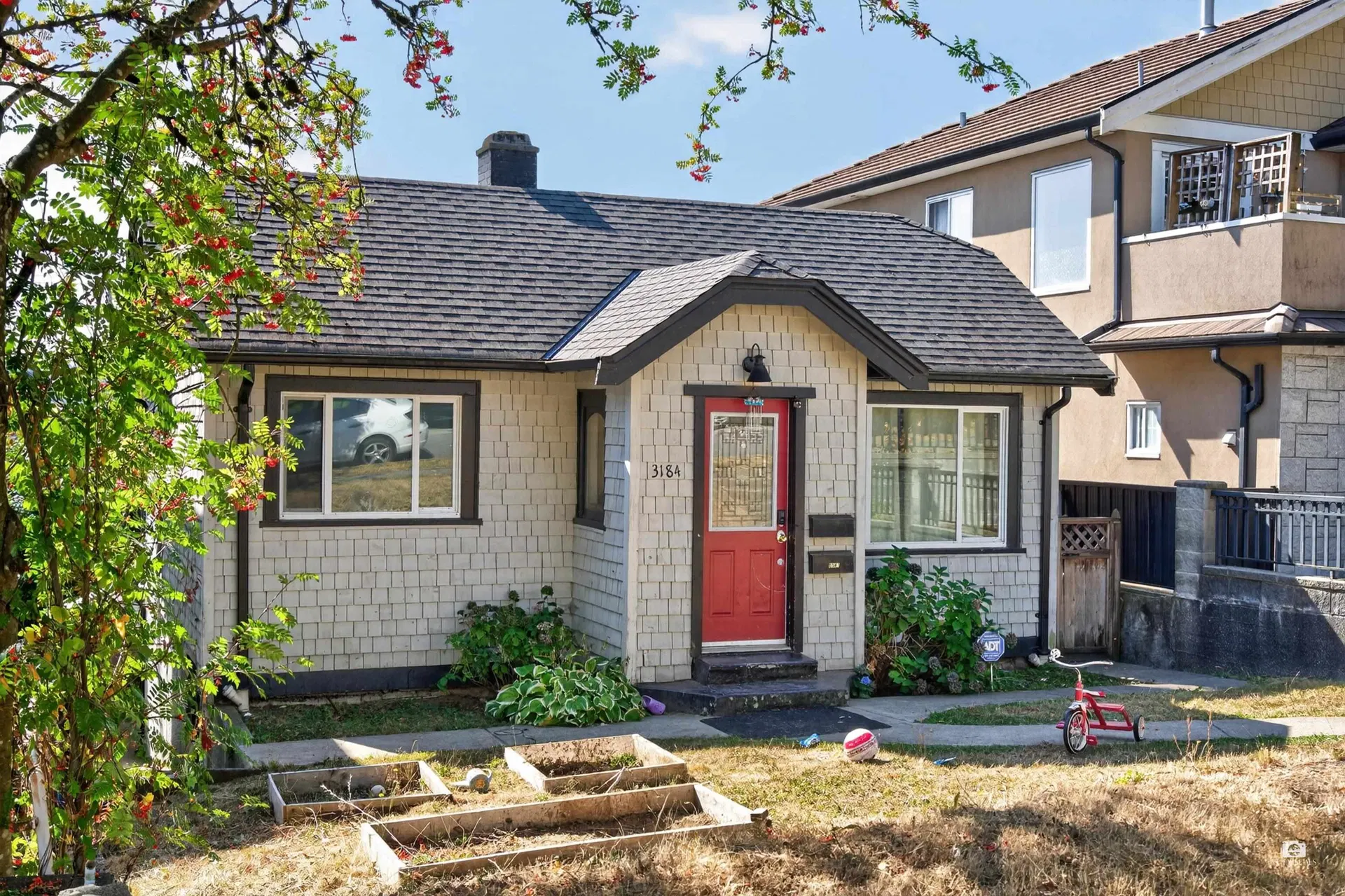 Photo 2 of 14 at 3184 E 8th Avenue