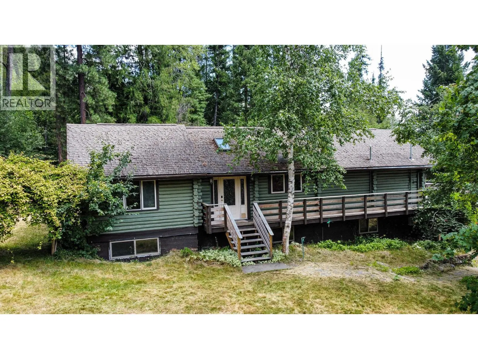 Photo 1 of 67 at 3026 Upper Slocan Park Road
