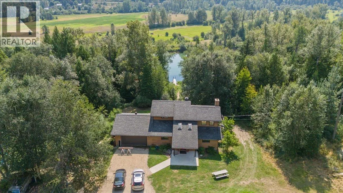 Photo 1 of 73 at 6172 SLOCAN RIVER Road