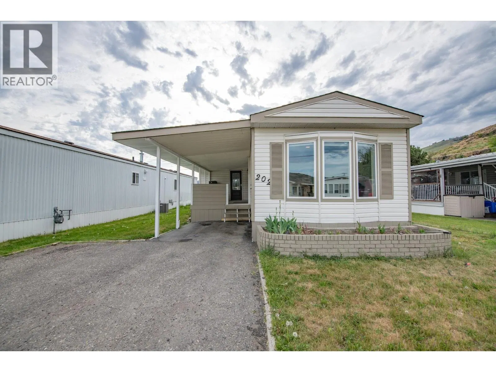 Photo 1 of 38 at #202 – 6710 Tronson Road