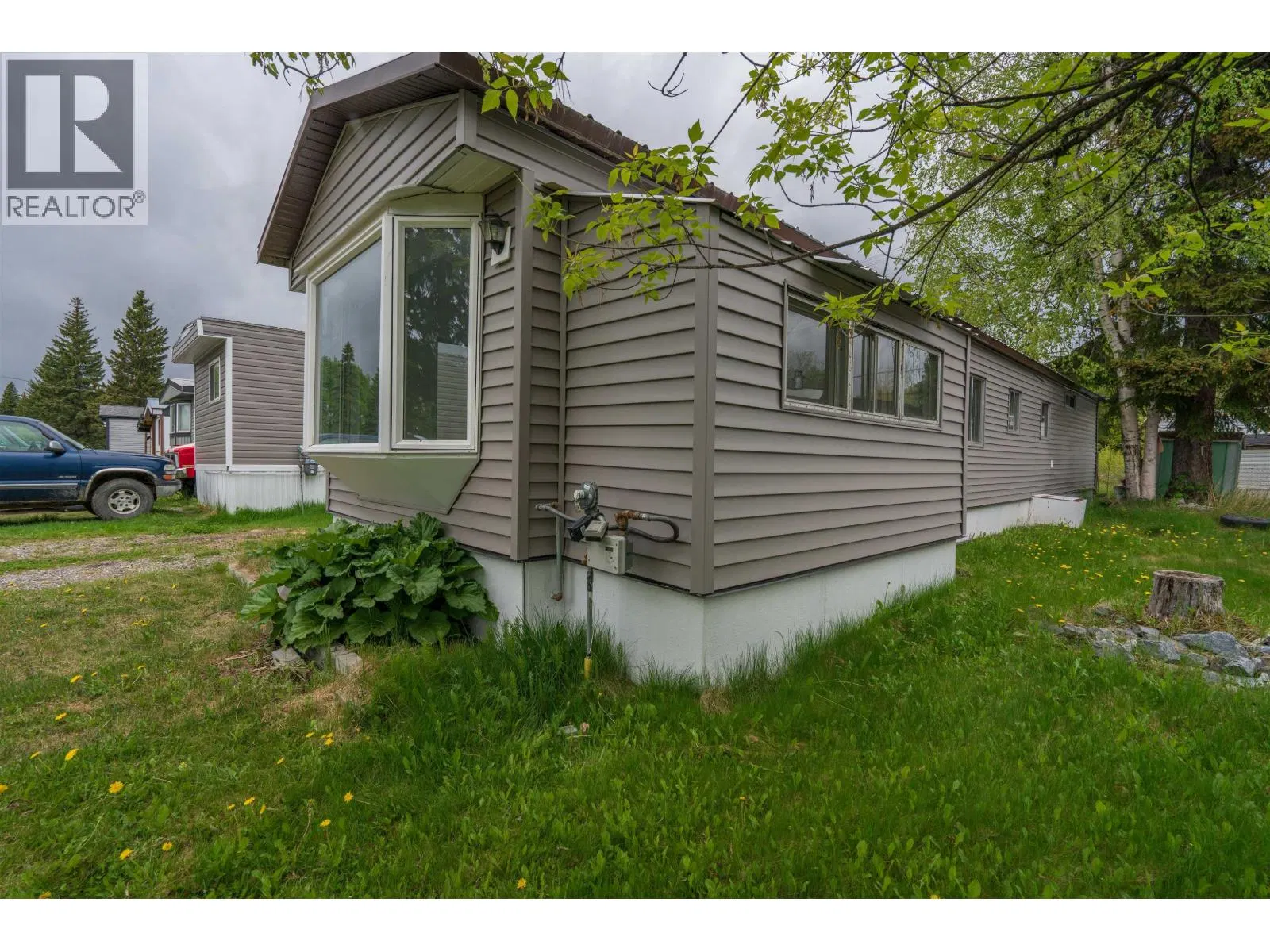 Photo 1 of 21 at #7 – 8474 BUNCE Road