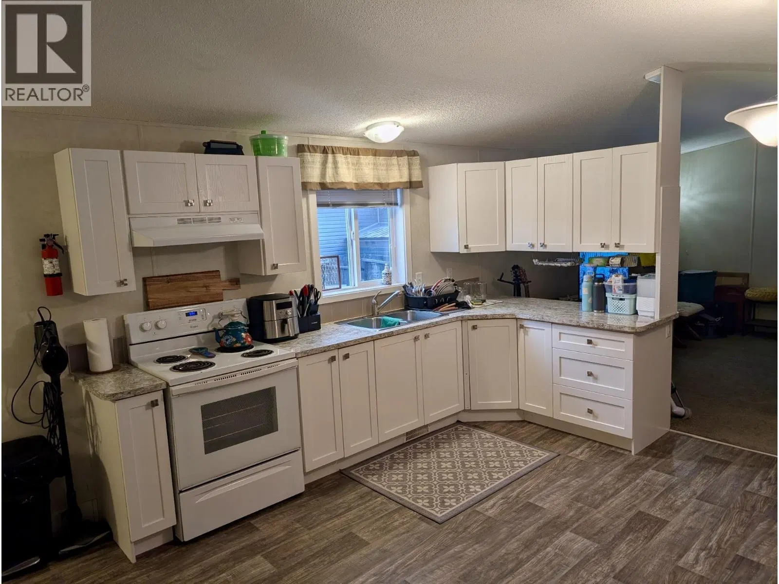 Photo 4 of 14 at #32 – 4619 LOWRIE Avenue