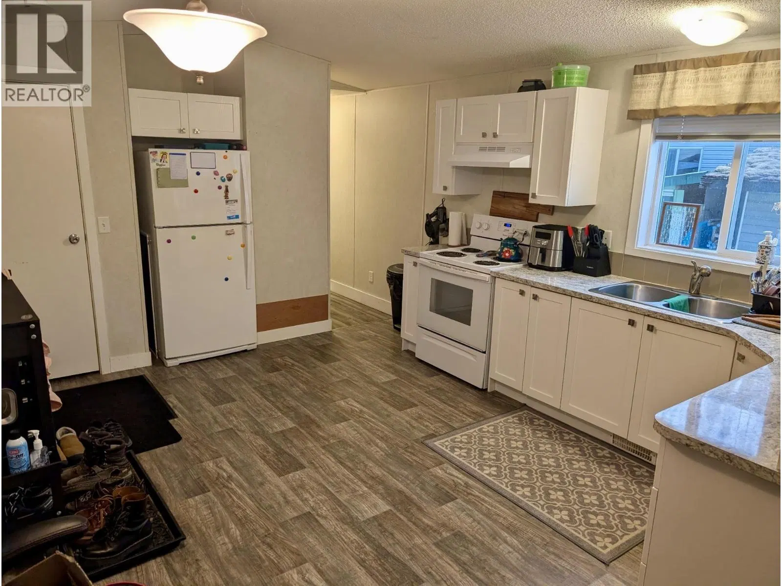 Photo 5 of 14 at #32 – 4619 LOWRIE Avenue