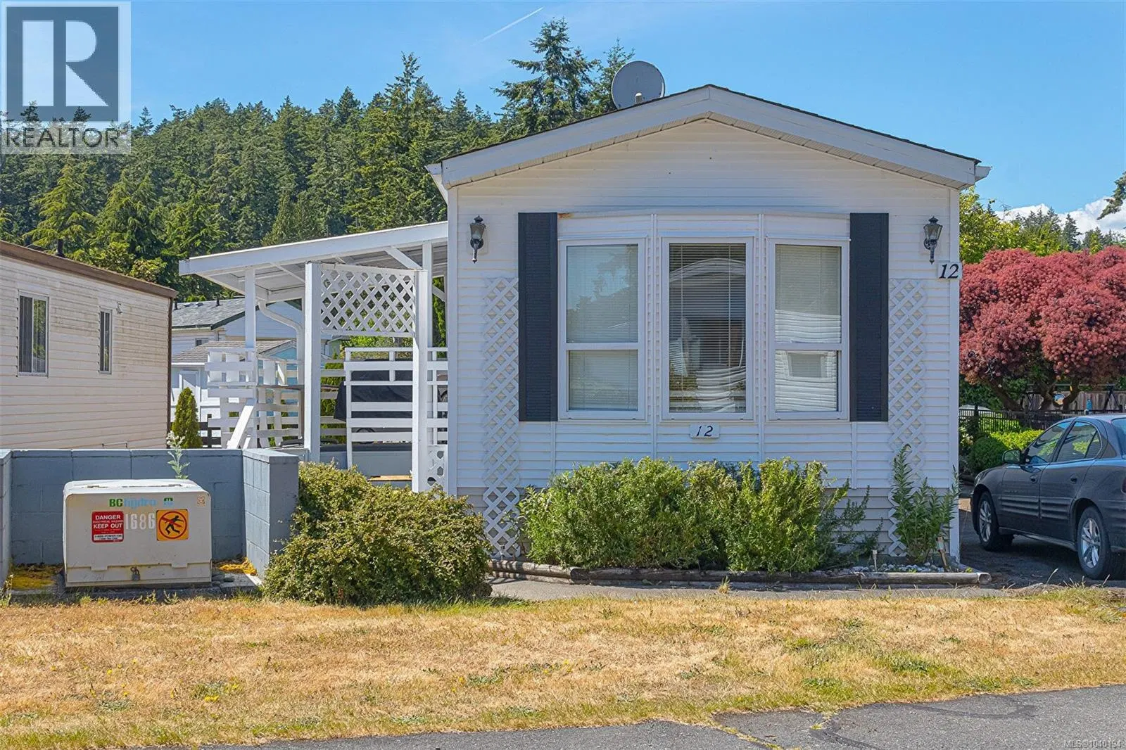 Photo 1 of 26 at #12 – 7871 West Coast Road