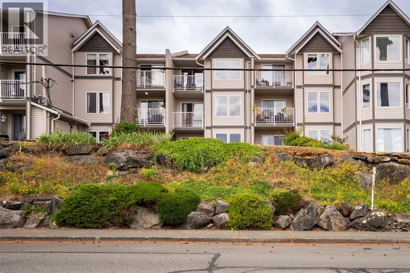 Photo 1 of 27 at #204 – 9916 Daniel Street