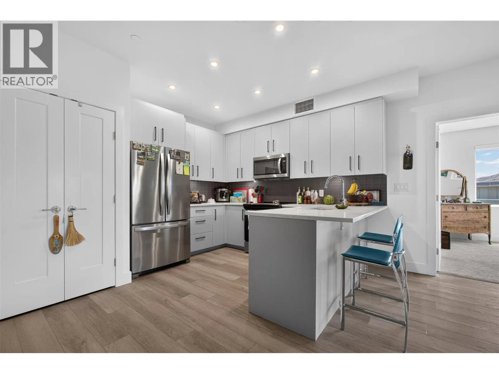 Photo 3 of 40 at #101 – 3434 Mckinley Beach Drive