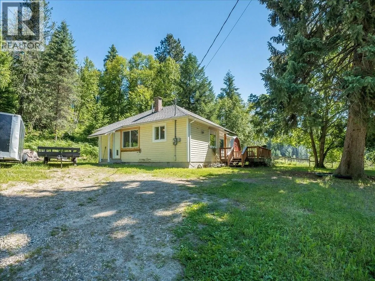 Photo 1 of 43 at 5875 SLOCAN RIVER Road