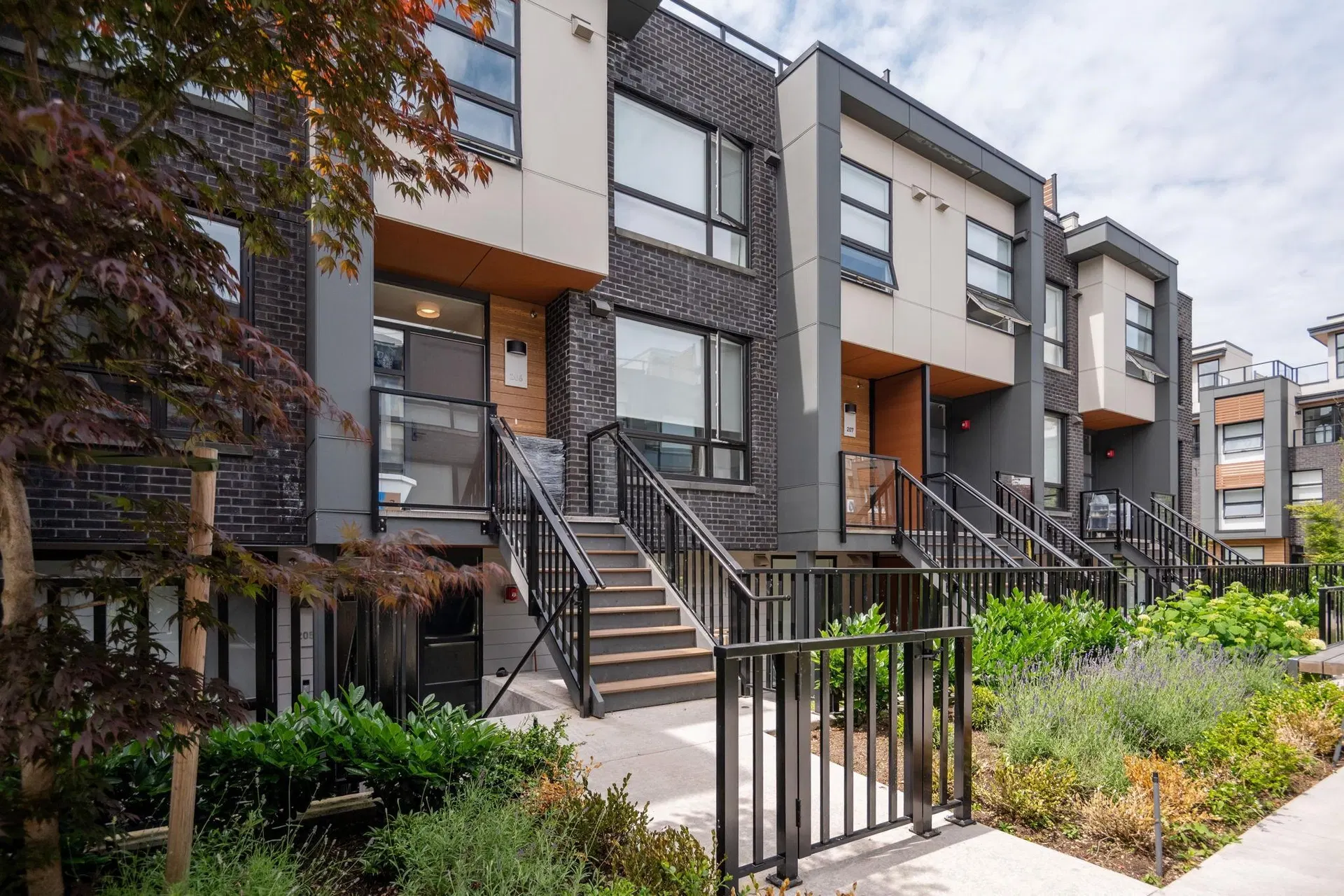 Photo 1 of 38 at #206 – 6085 Irmin Street