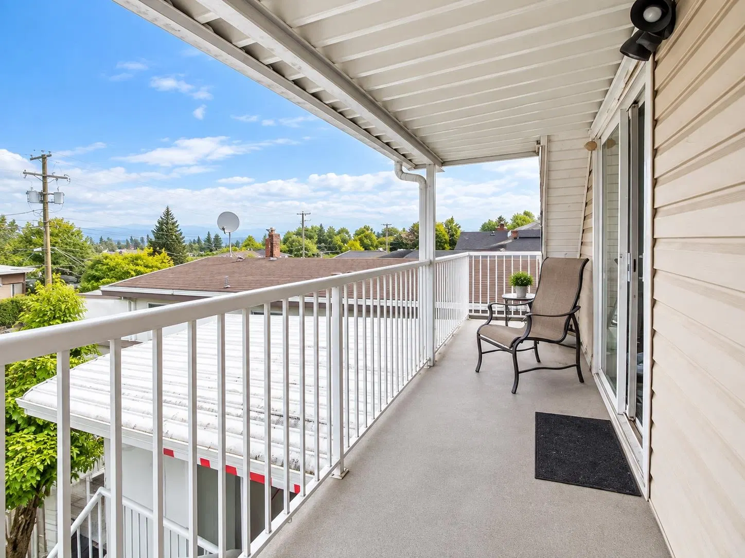 Photo 1 of 7 at Top – 4265 Slocan Street