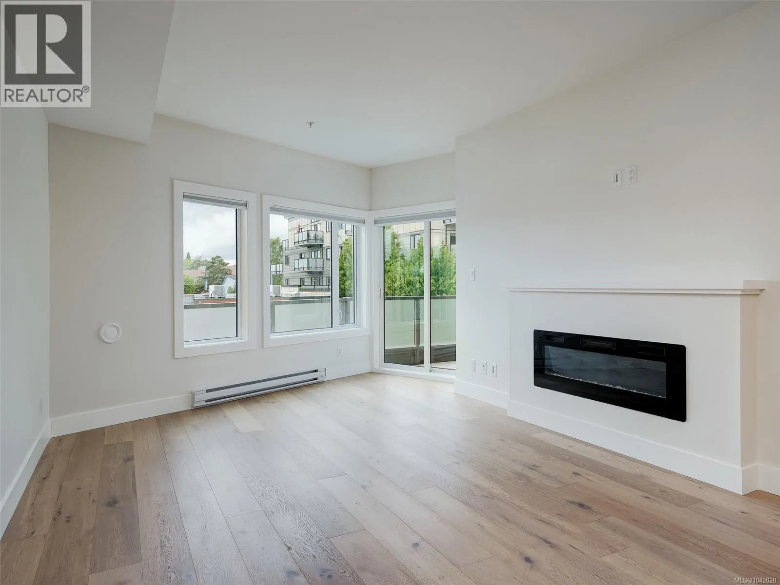 Photo 4 of 34 at #203 – 7098 Wallace Drive