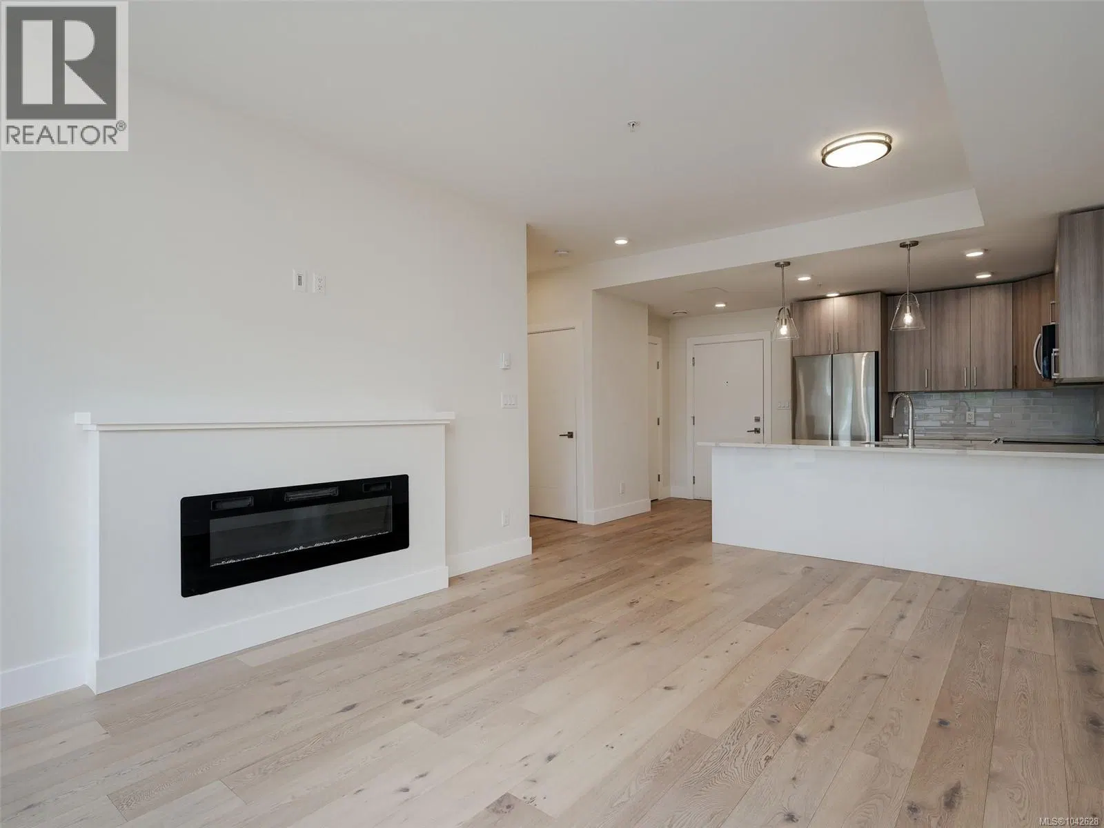 Photo 5 of 34 at #203 – 7098 Wallace Drive