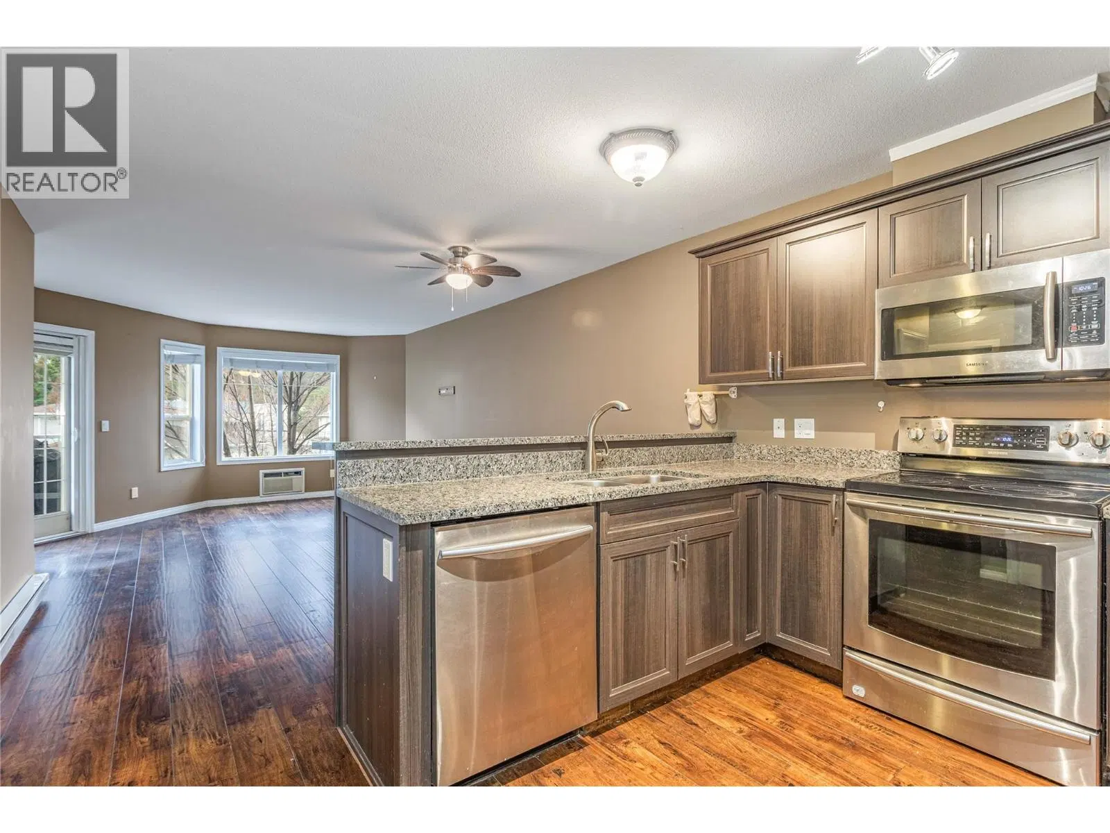 Photo 1 of 27 at #102 – 2733 Riffington Place