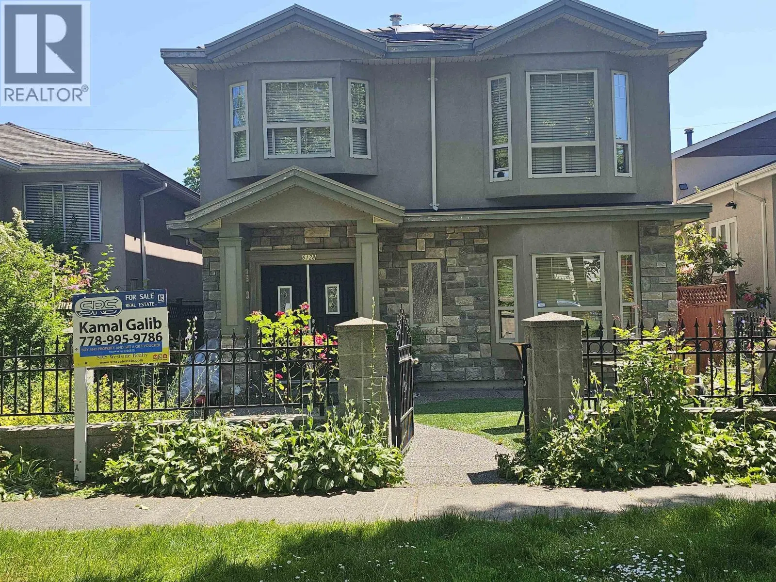 Photo 1 of 5 at 6128 ST CATHERINE Street