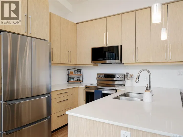 Photo 5 of 41 at #401 – 7161 West Saanich Road