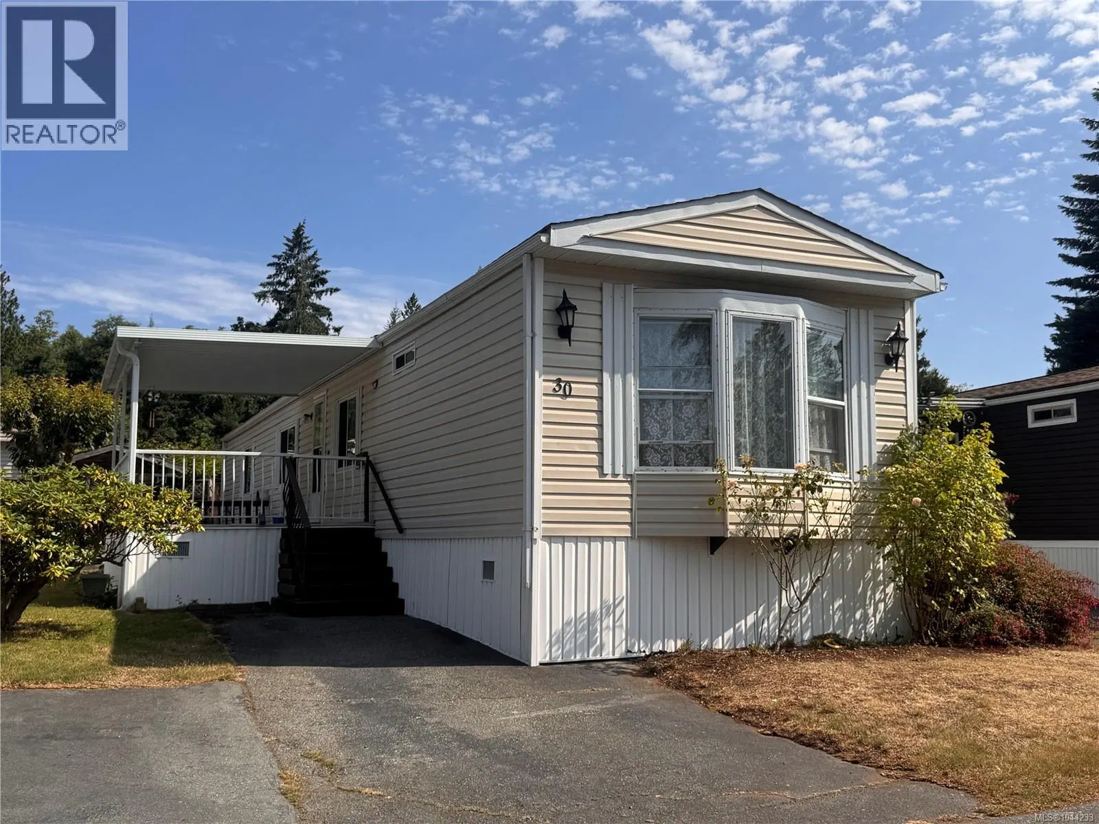 Photo 1 of 21 at #30 – 5854 Turner Road