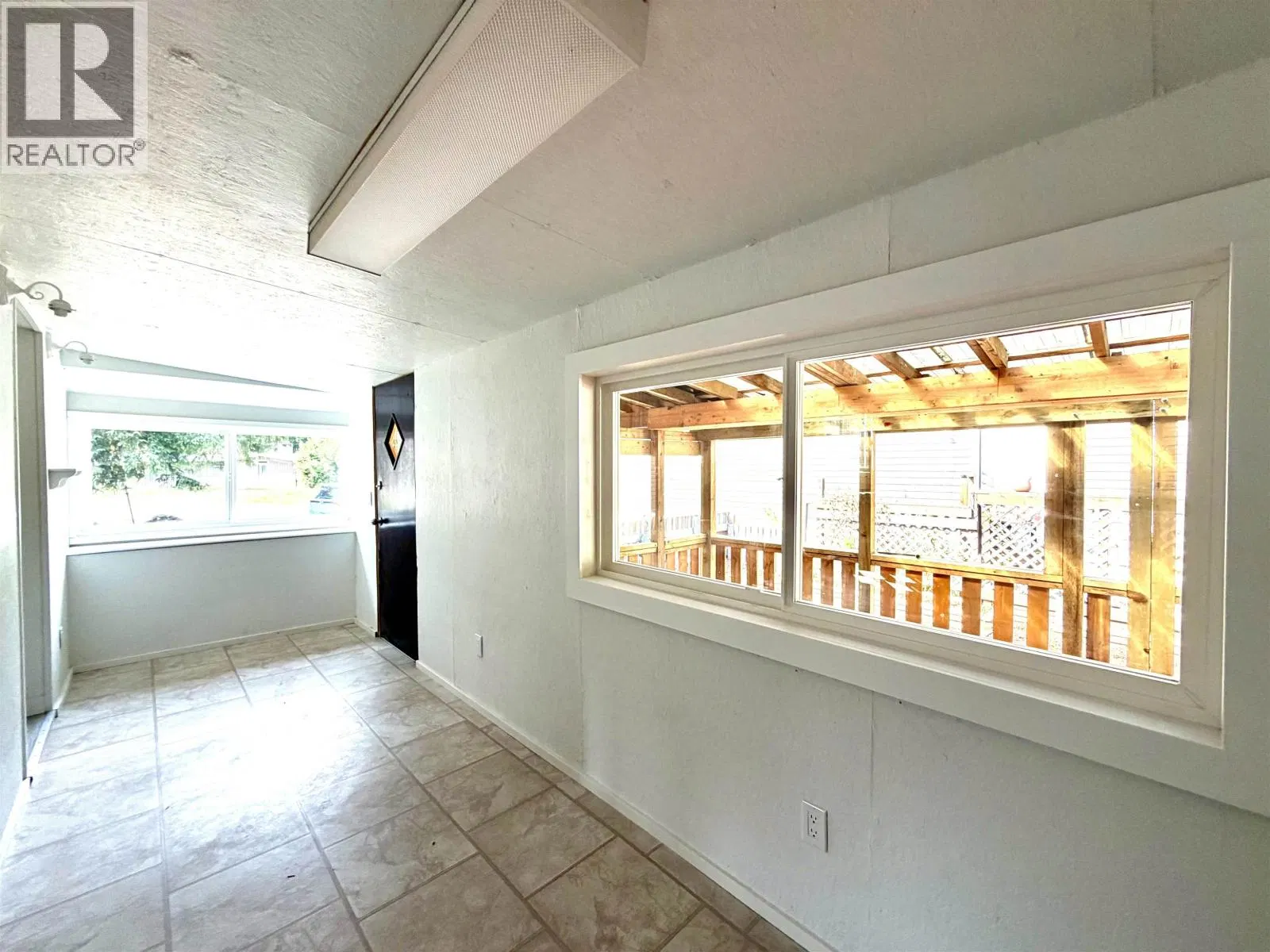 Photo 3 of 12 at #9 – 4620 LOWRIE Avenue