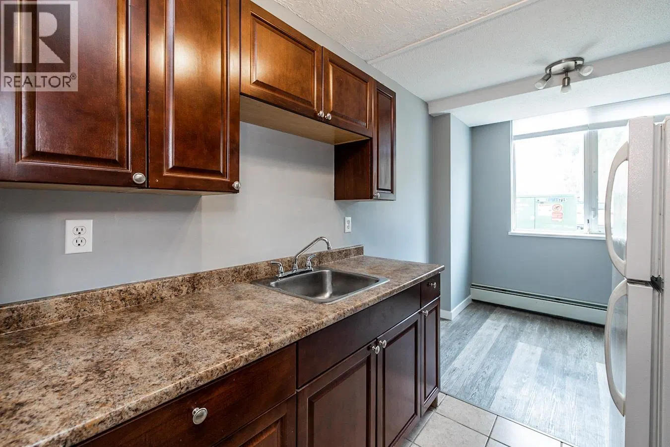 Photo 1 of 12 at #106 – 1501 QUEENSWAY