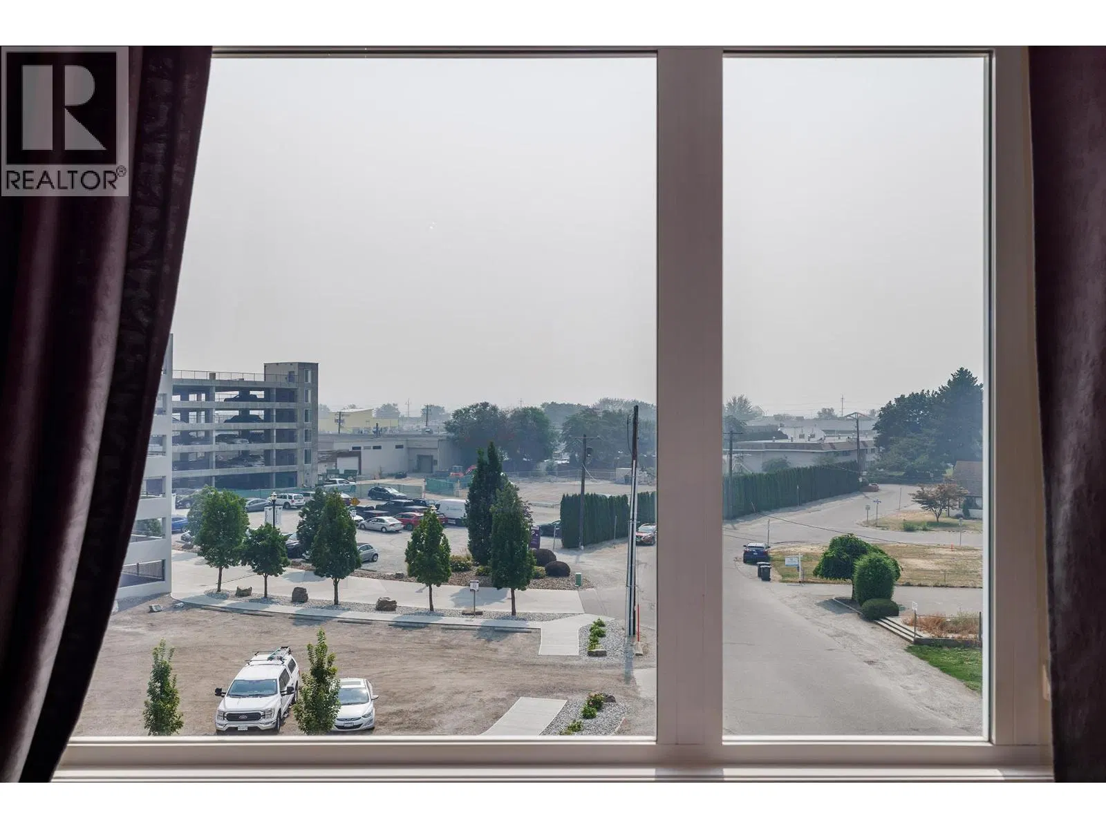 Photo 5 of 17 at #405 – 1550 Dickson Avenue