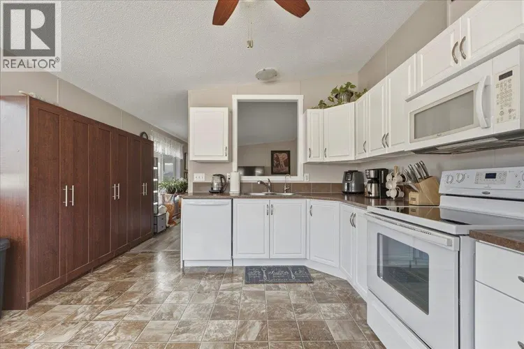 Photo 3 of 24 at #77 – 12560 Westside Road