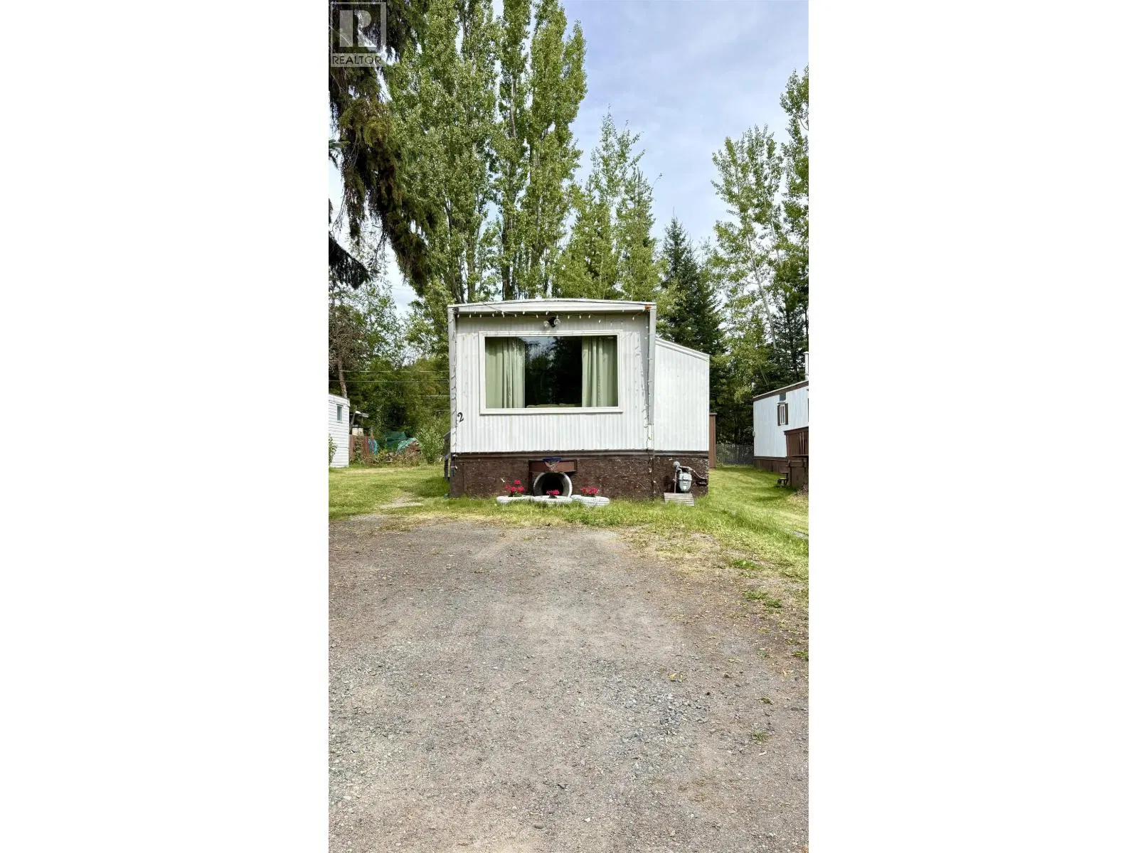 Photo 1 of 11 at #2 – 8474 BUNCE Road