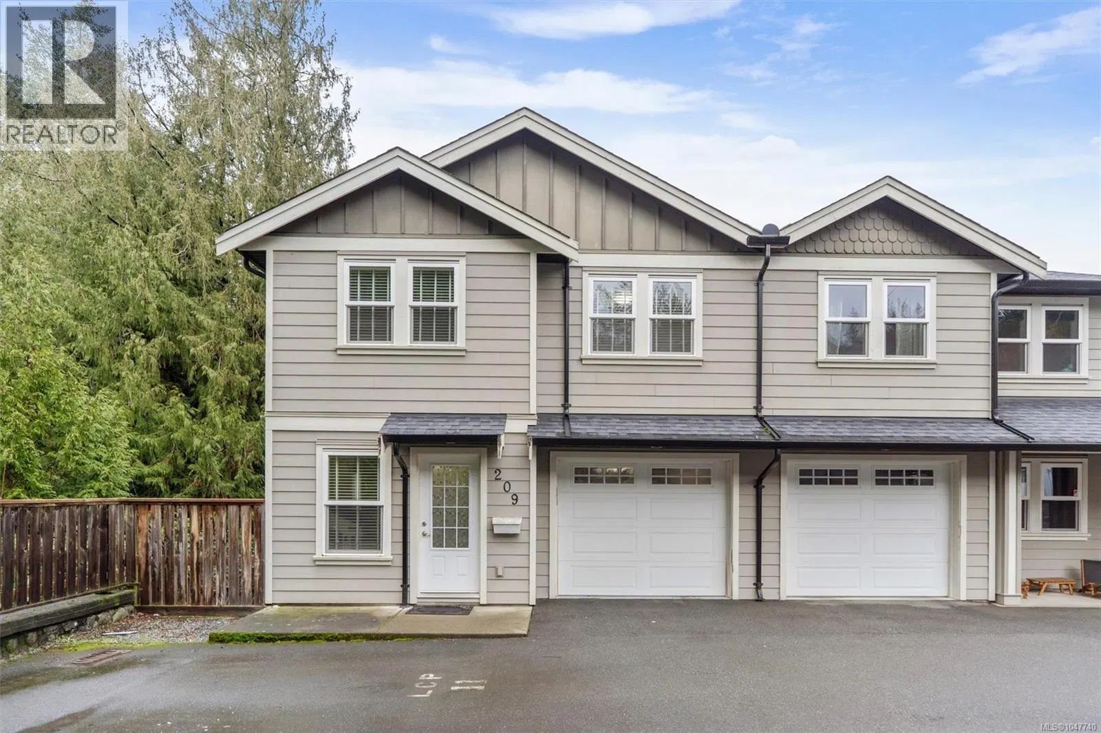 Photo 2 of 29 at #209 – 954 Walfred Road