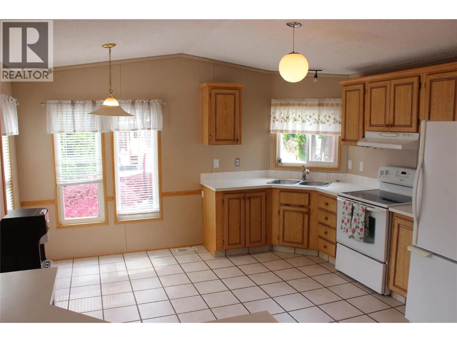 Photo 2 of 15 at #17 – 1440 Ord Road
