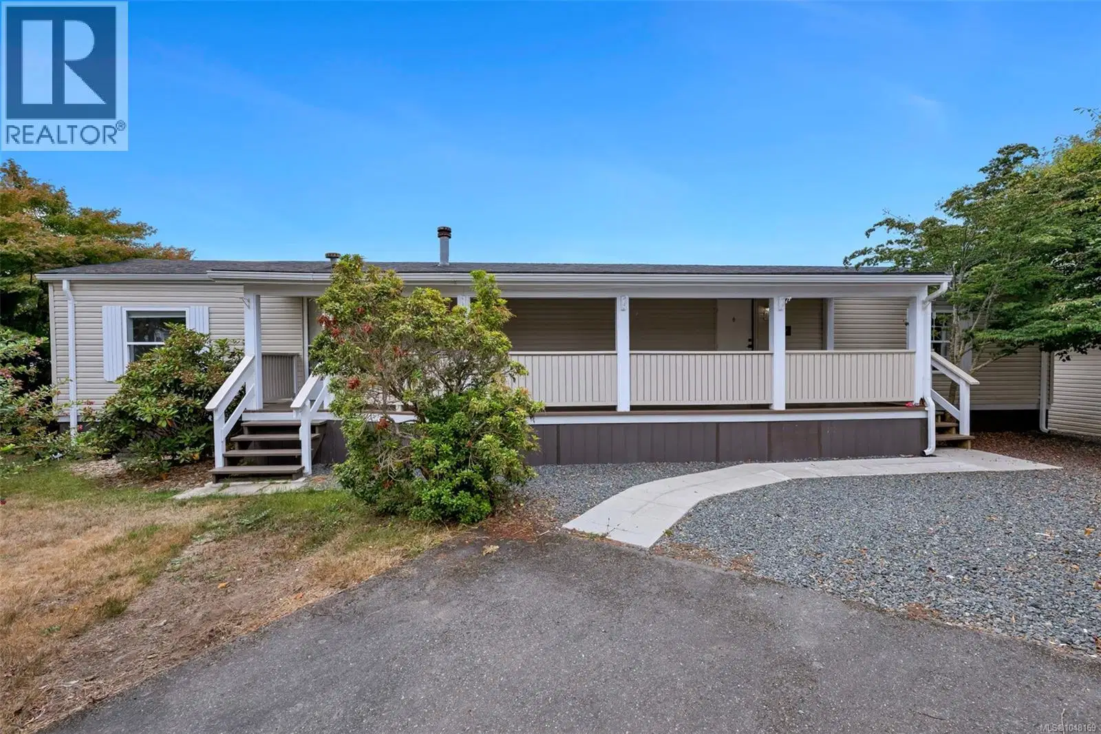 #32 – 7021 Grant Road