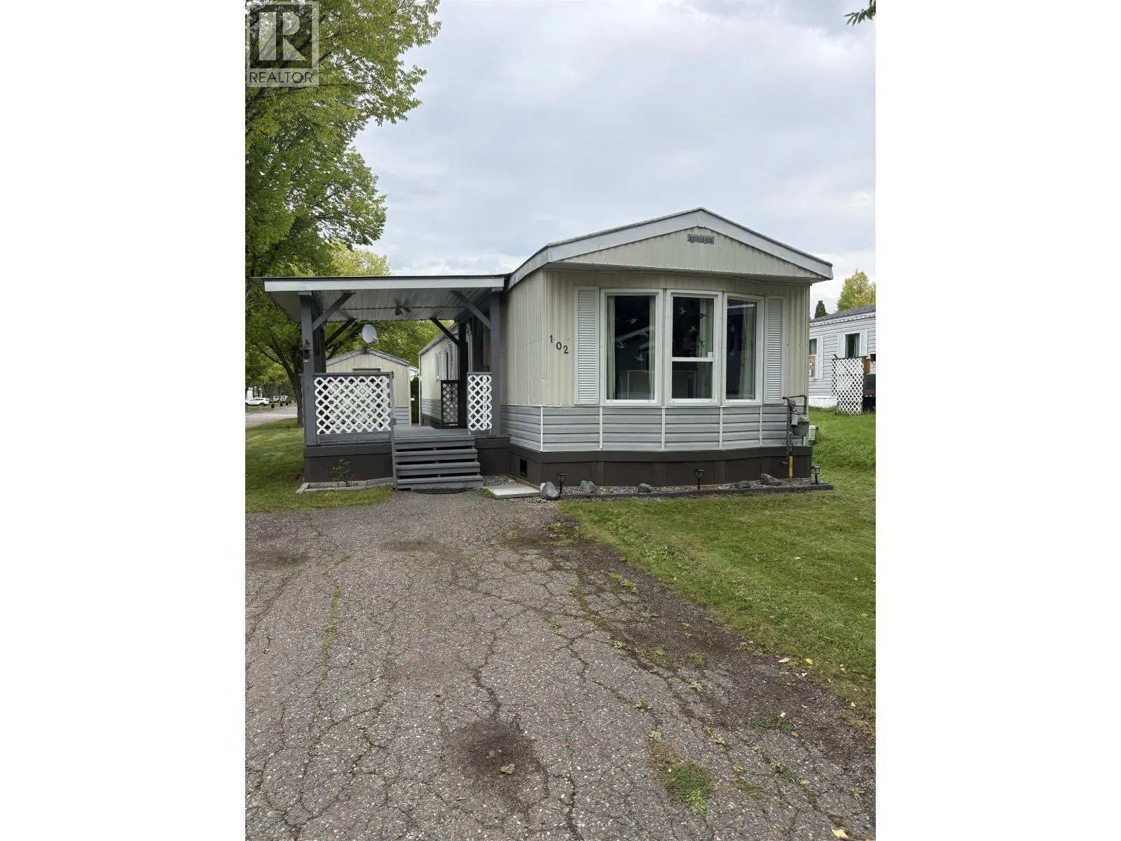 Photo 1 of 30 at #102 – 1000 INVERNESS Road