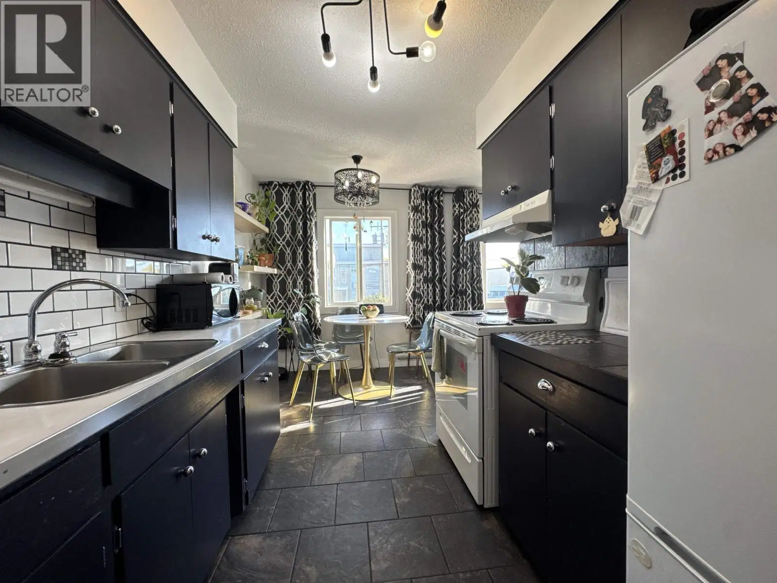 #208 – 9815 104 Avenue