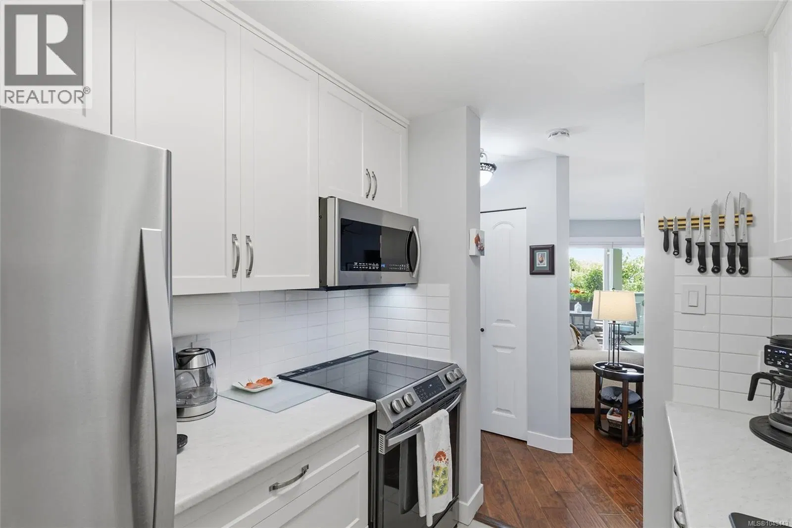 Photo 4 of 40 at #207 – 4971 Songbird Place