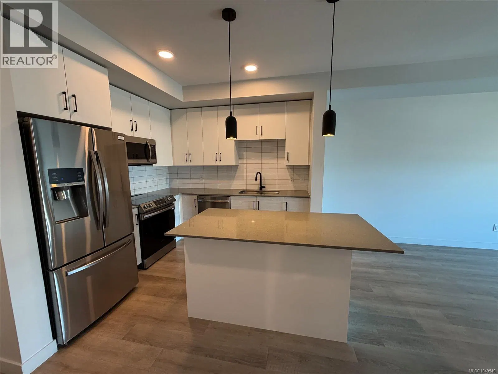 Photo 4 of 15 at #404 – 2469 Gateway Road
