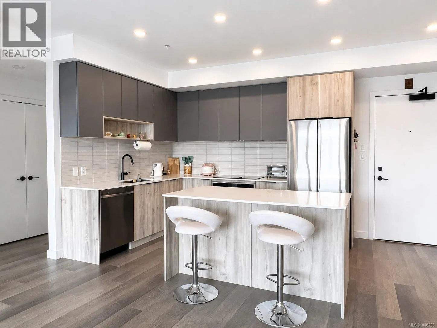Photo 1 of 23 at #311 – 3564B Ryder Hesjedal Way