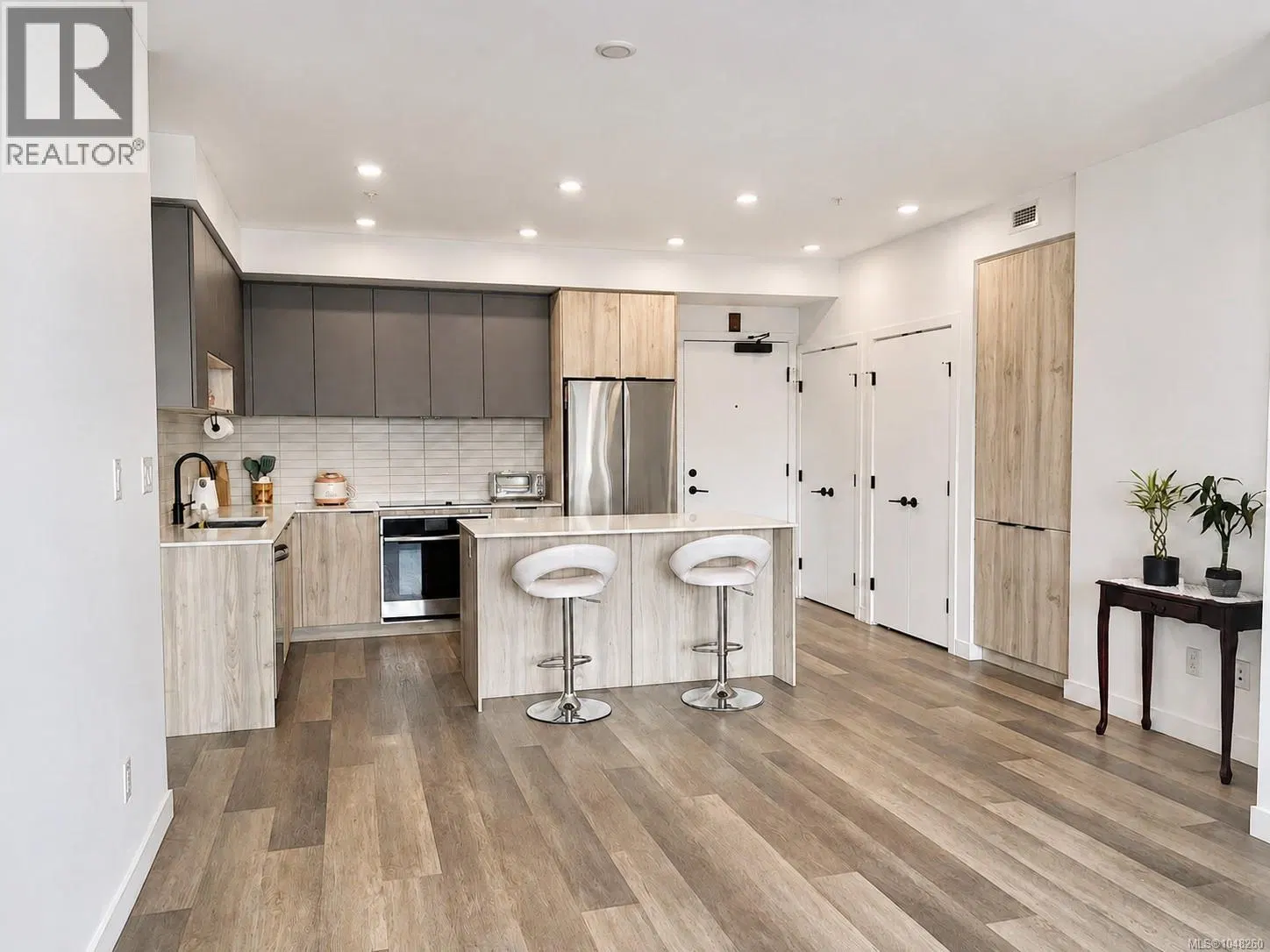Photo 4 of 23 at #311 – 3564B Ryder Hesjedal Way