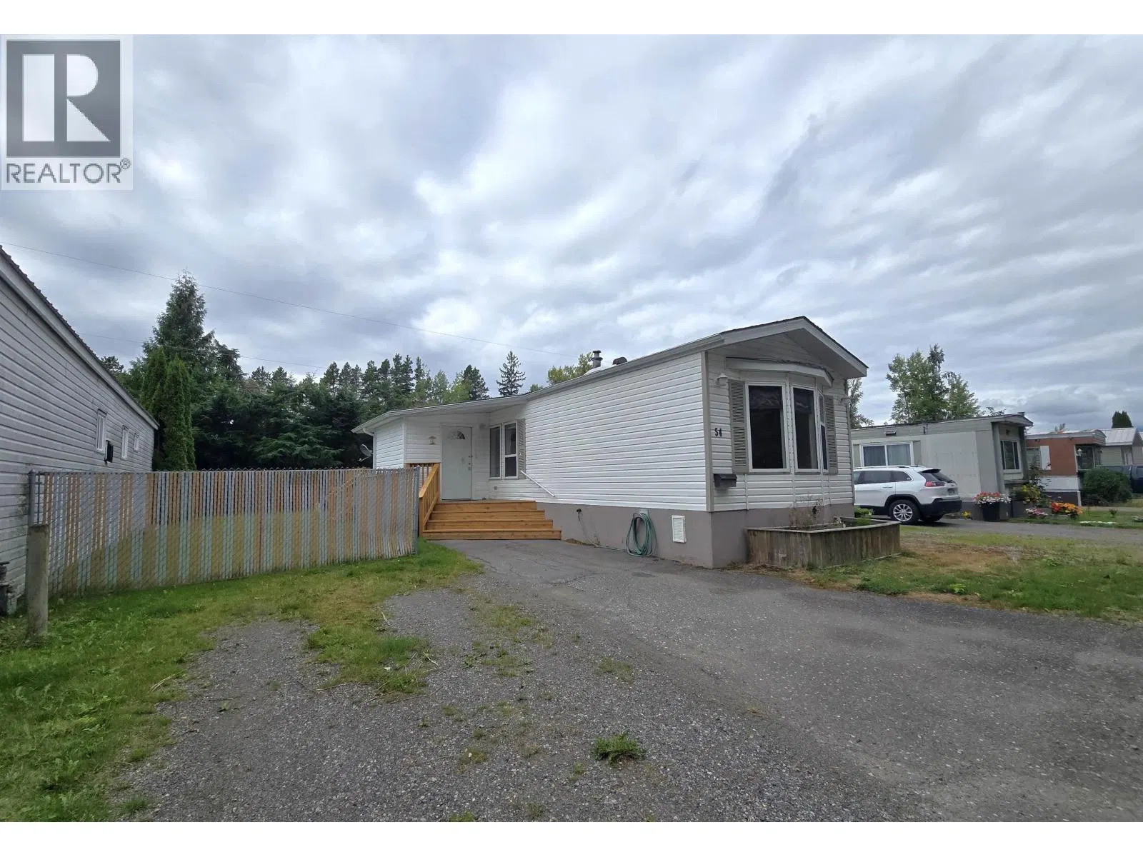 Photo 1 of 17 at #54 – 4625 GRAHAM Avenue