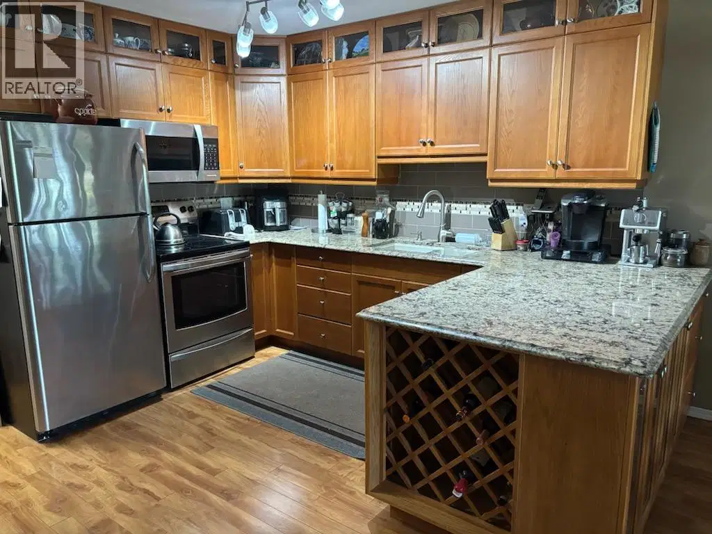 #303 – 7140 4th Street