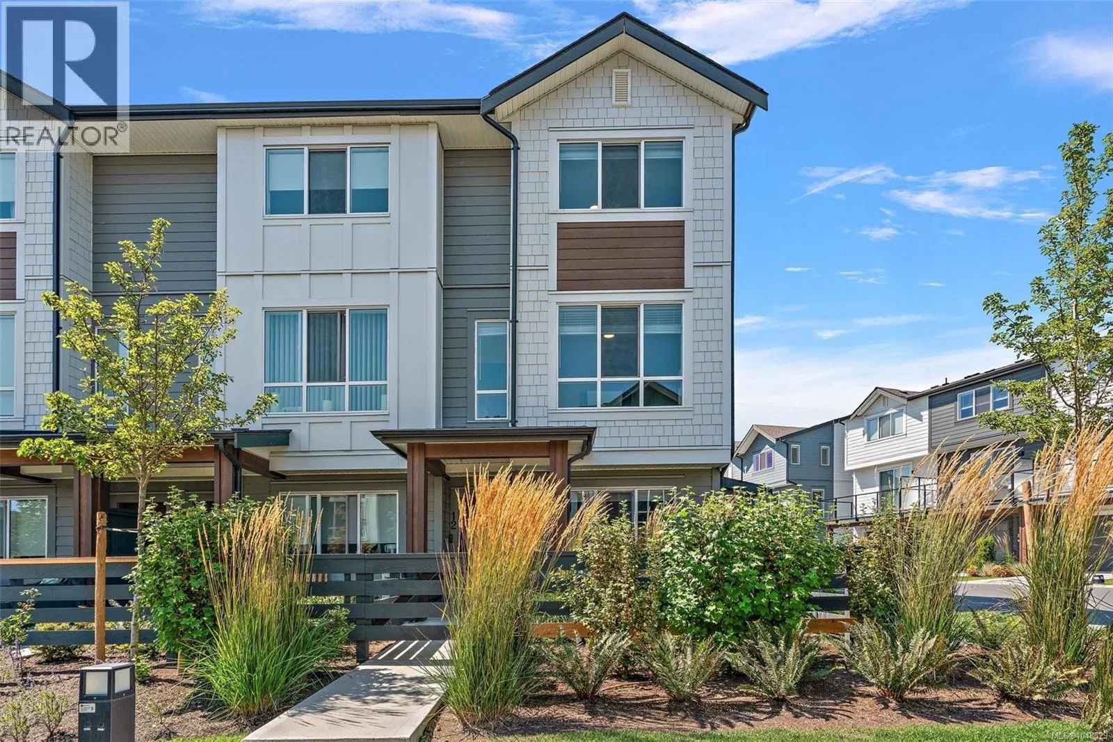 Photo 1 of 32 at #12 – 368 Tradewinds Avenue