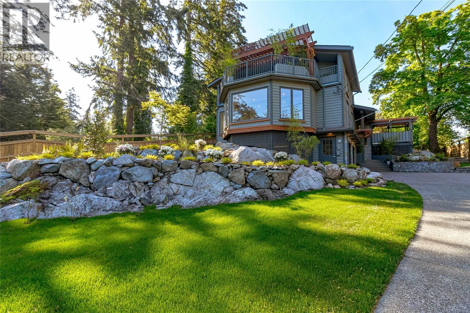 Photo 2 of 63 at 4906 Cordova Bay Road