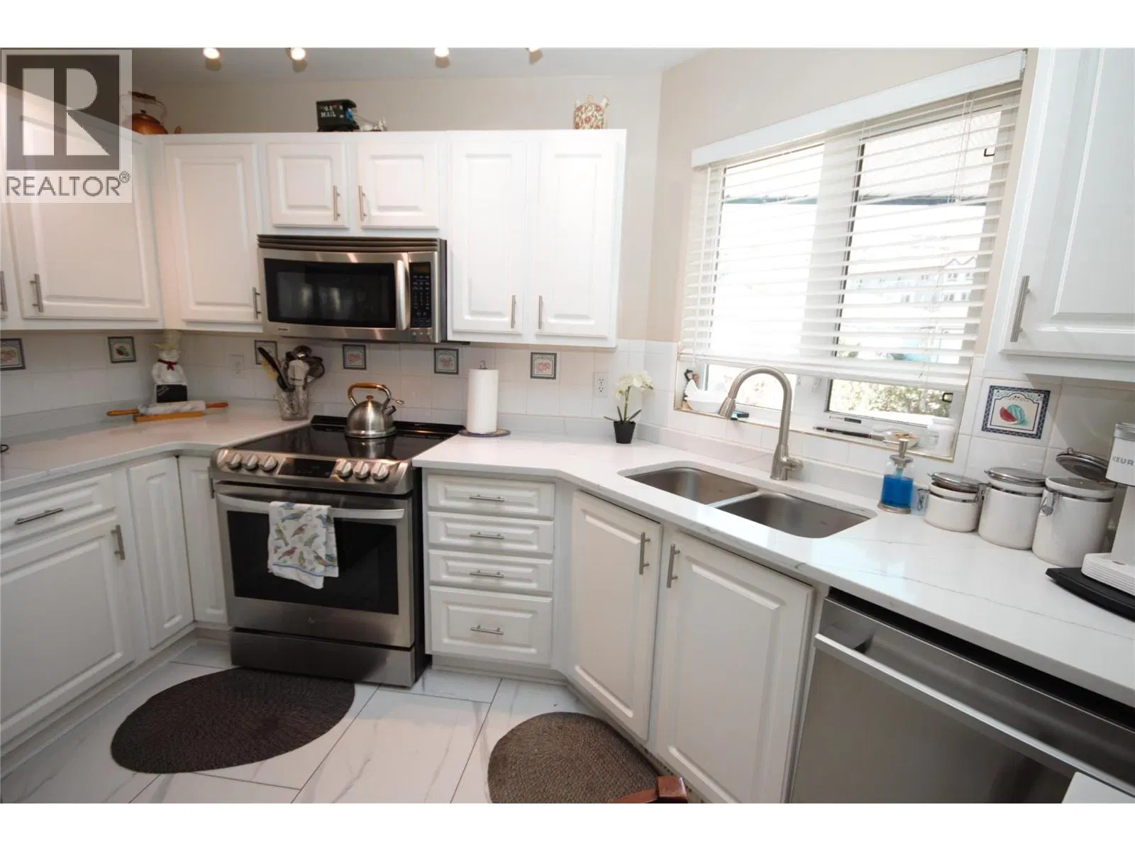 Photo 3 of 46 at #14 – 6446 MEADOWS Drive