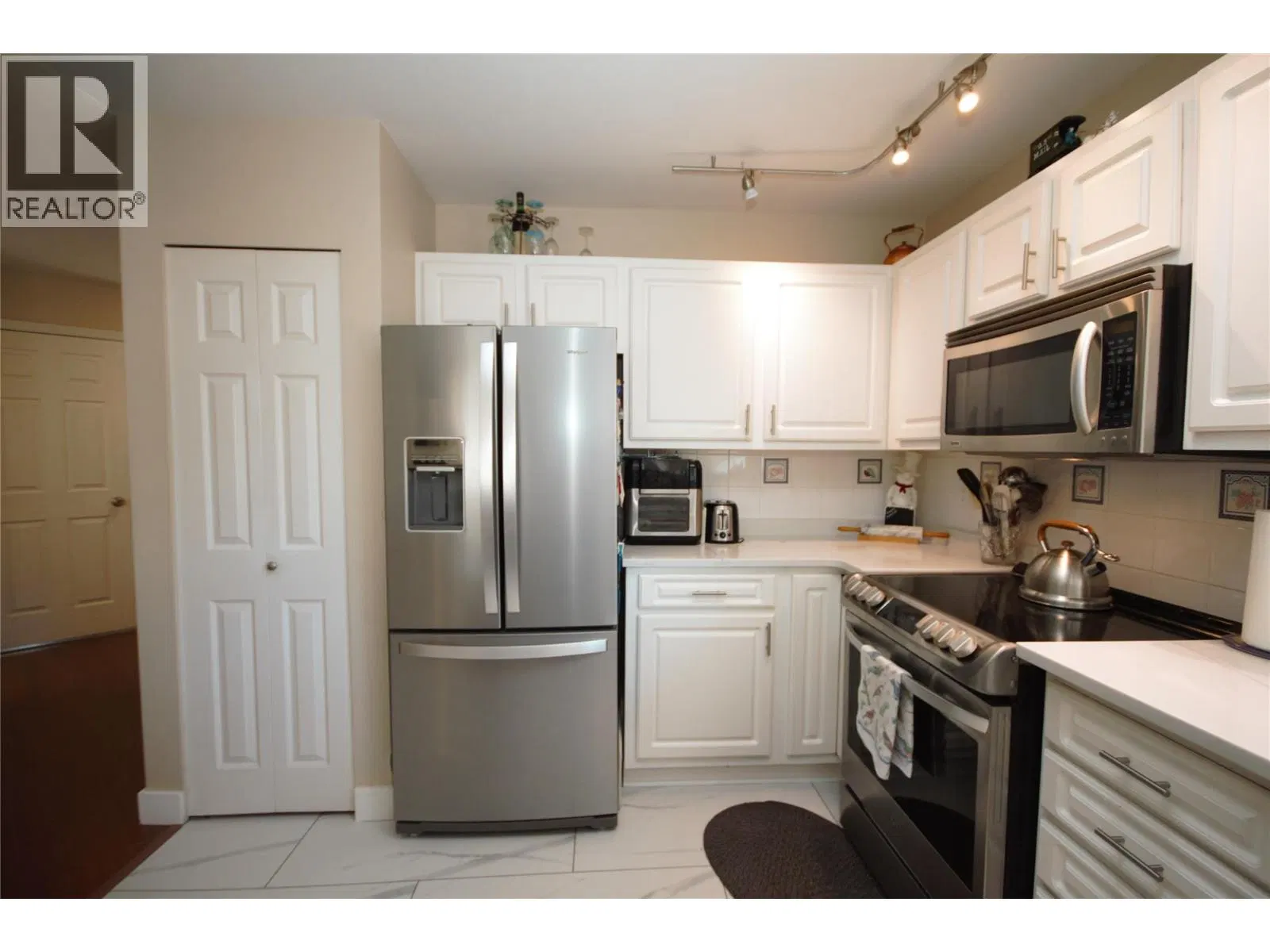 Photo 4 of 46 at #14 – 6446 MEADOWS Drive