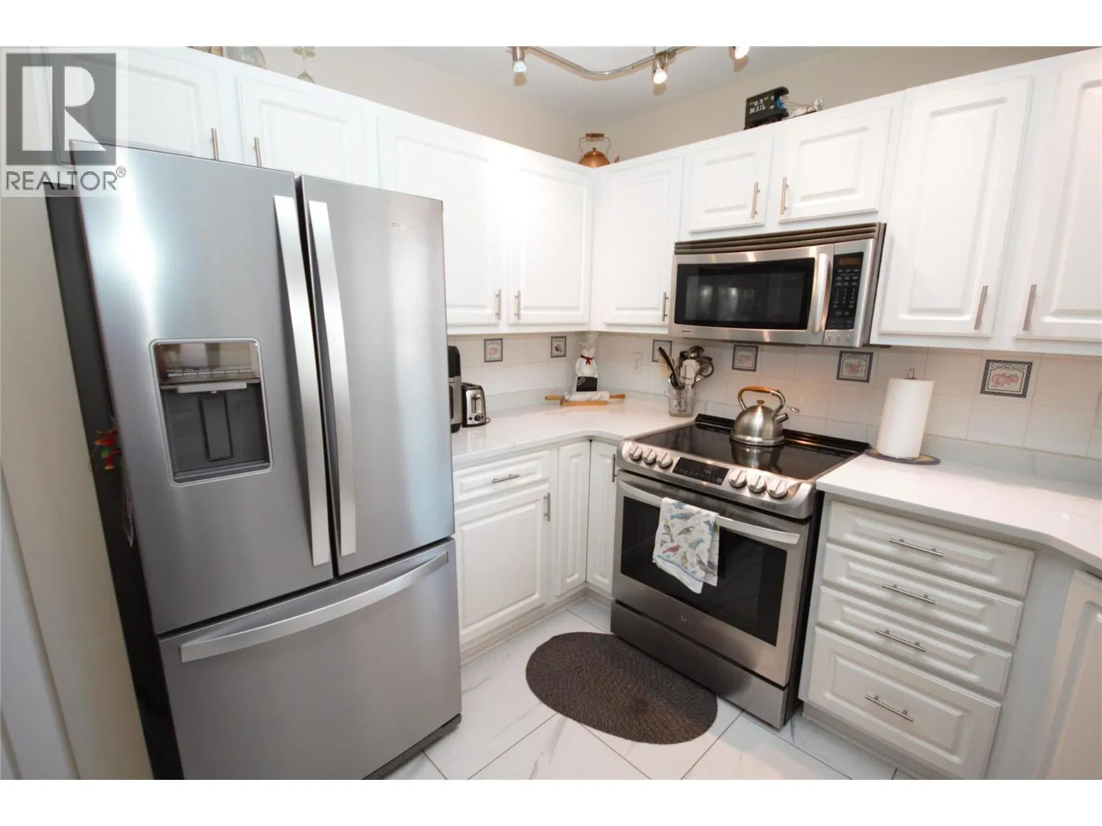 Photo 5 of 46 at #14 – 6446 MEADOWS Drive