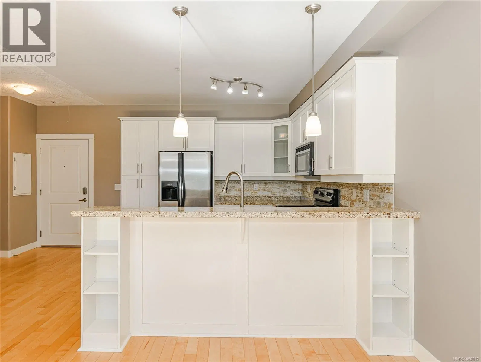 Photo 5 of 37 at #317 – 2710 Jacklin Road