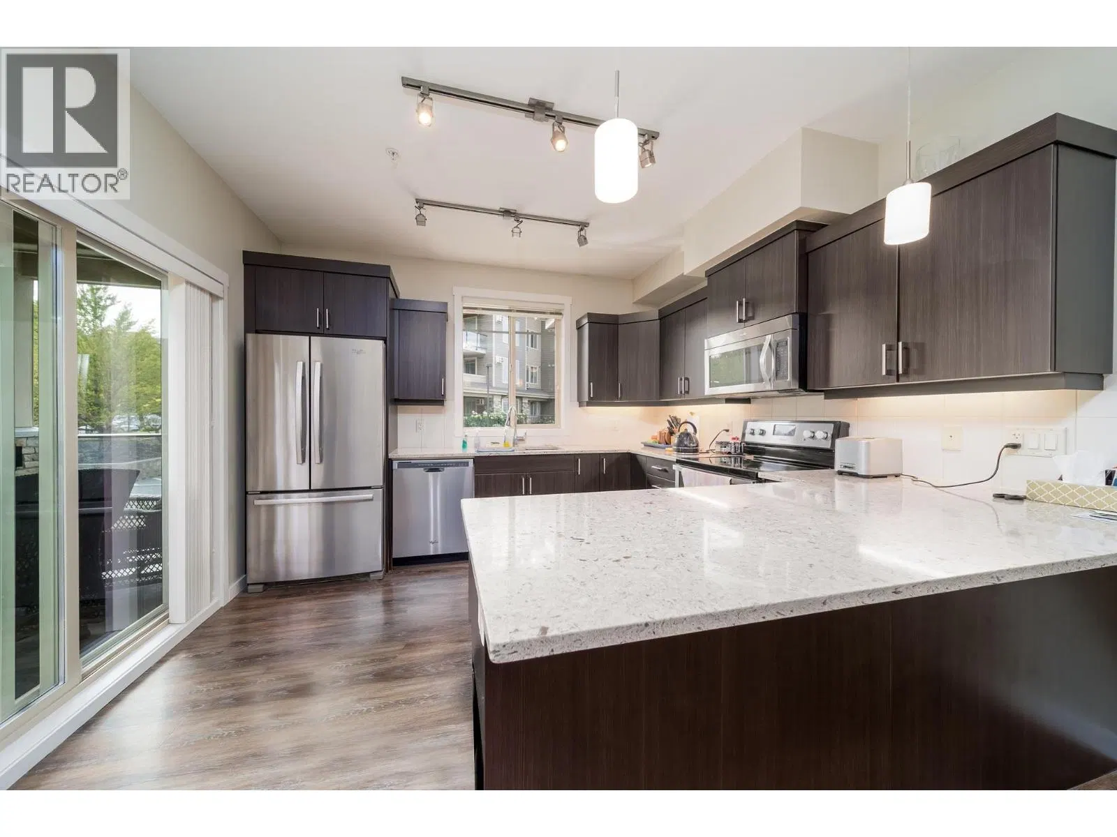 Photo 4 of 48 at #104 – 3733 Casorso Road