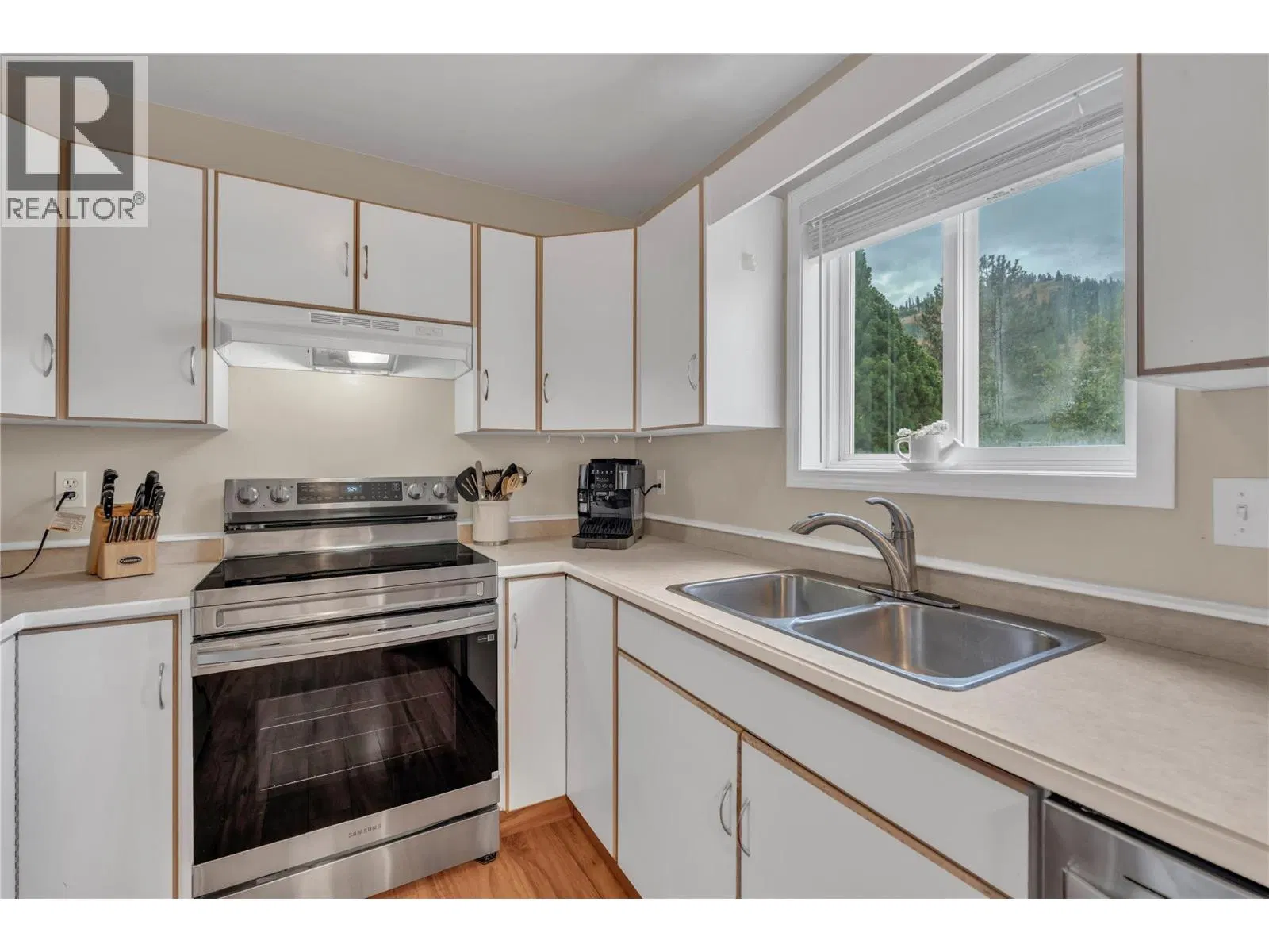 Photo 3 of 35 at #4 – 8710 Prairie Valley Road