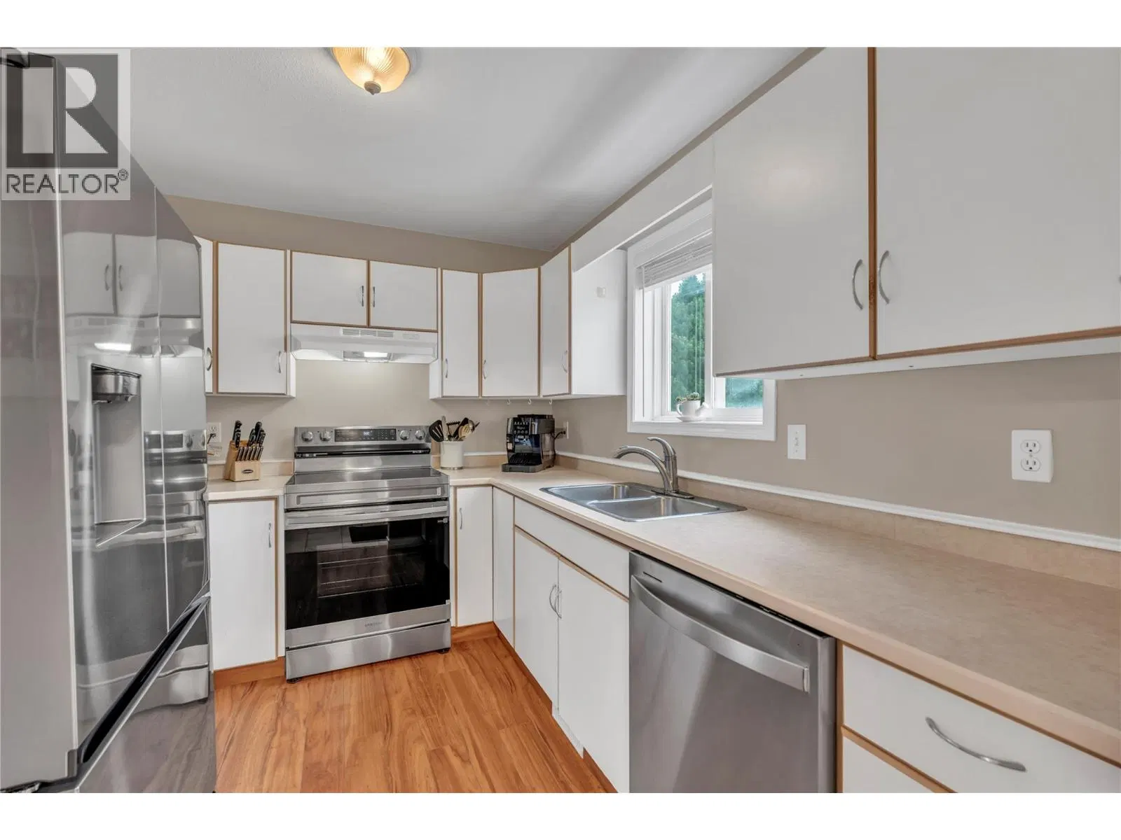 Photo 5 of 35 at #4 – 8710 Prairie Valley Road