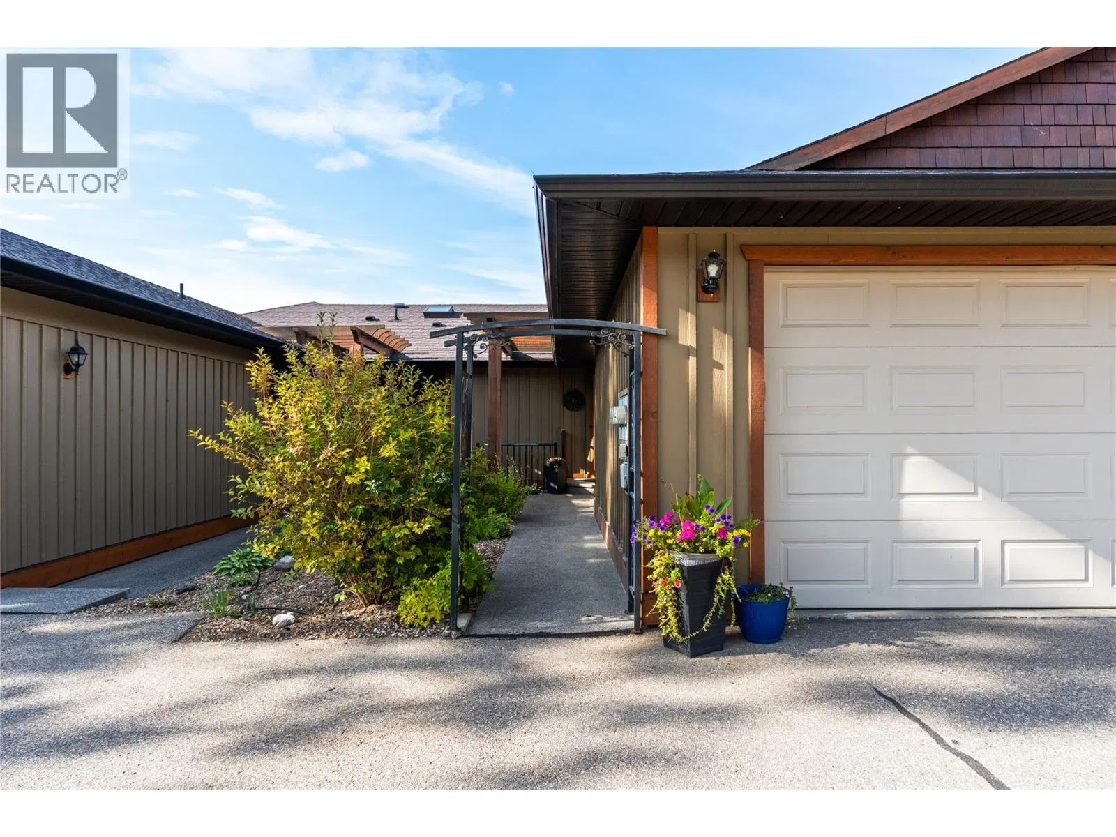 Photo 2 of 57 at #2 – 6900 Manning Place