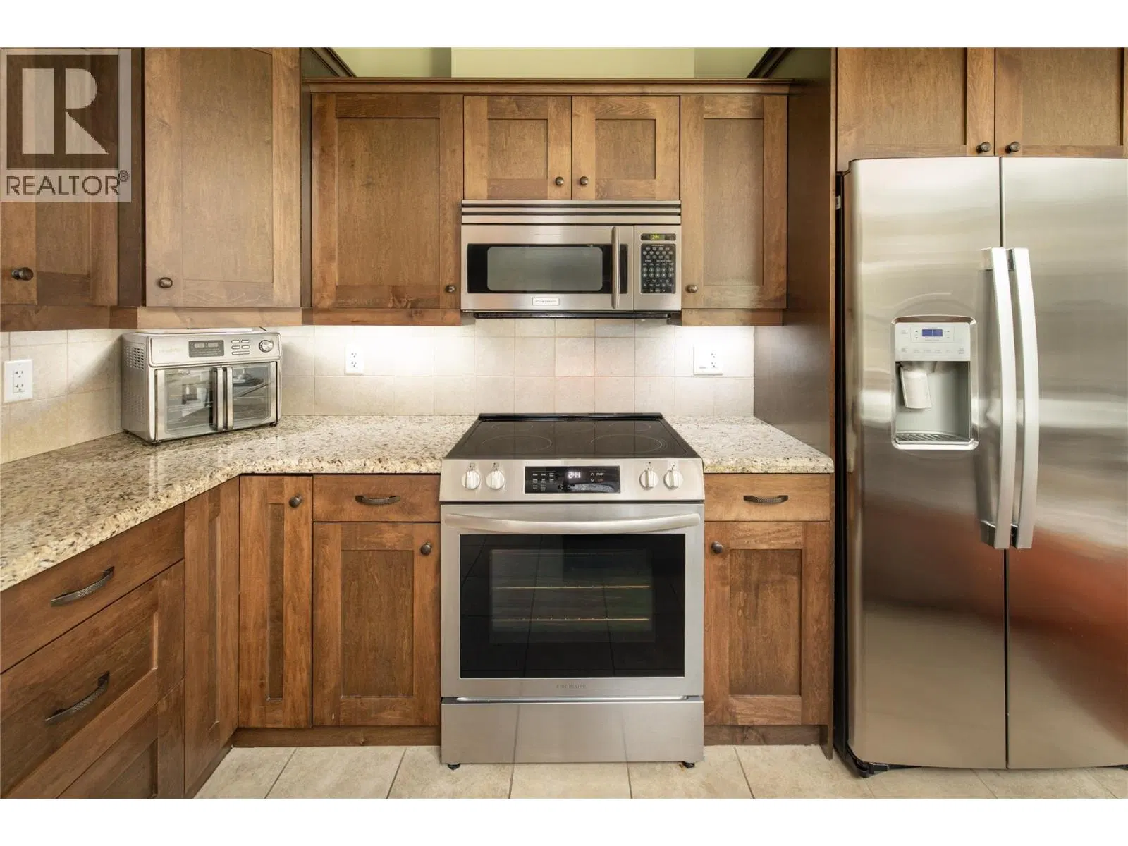 Photo 5 of 24 at #207 – 2470 Tuscany Drive